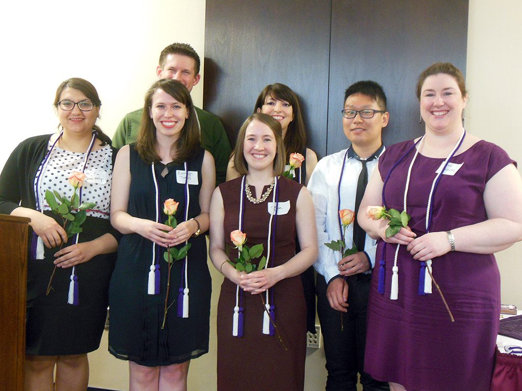 2015 Pi Lambda Sigma In Person Initiates (Front row, L to R): Dina E. Meky, Kathryn A. Justus, Kyra Leanne Nay, Wei Quan, and Nancarrow Ann Brown. (Back row, L to R): Brandon Michael Fess and Margaret Mcinnis. Initiates In Absentia include Sarah E. Bratt, Elizabeth Ashley Crowder, and Jennifer A. Peters.
